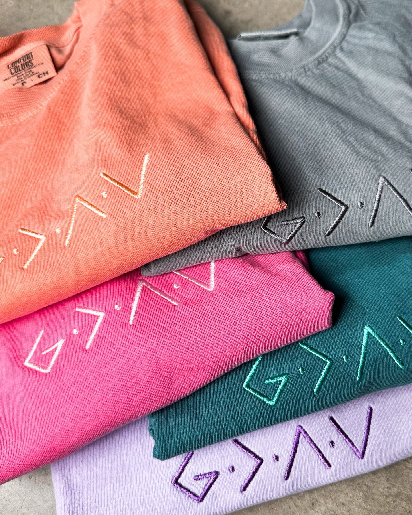 God Is Greater Than Highs & Lows Embroidered Tee