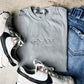 God Is Greater Than Highs & Lows Embroidered Tee