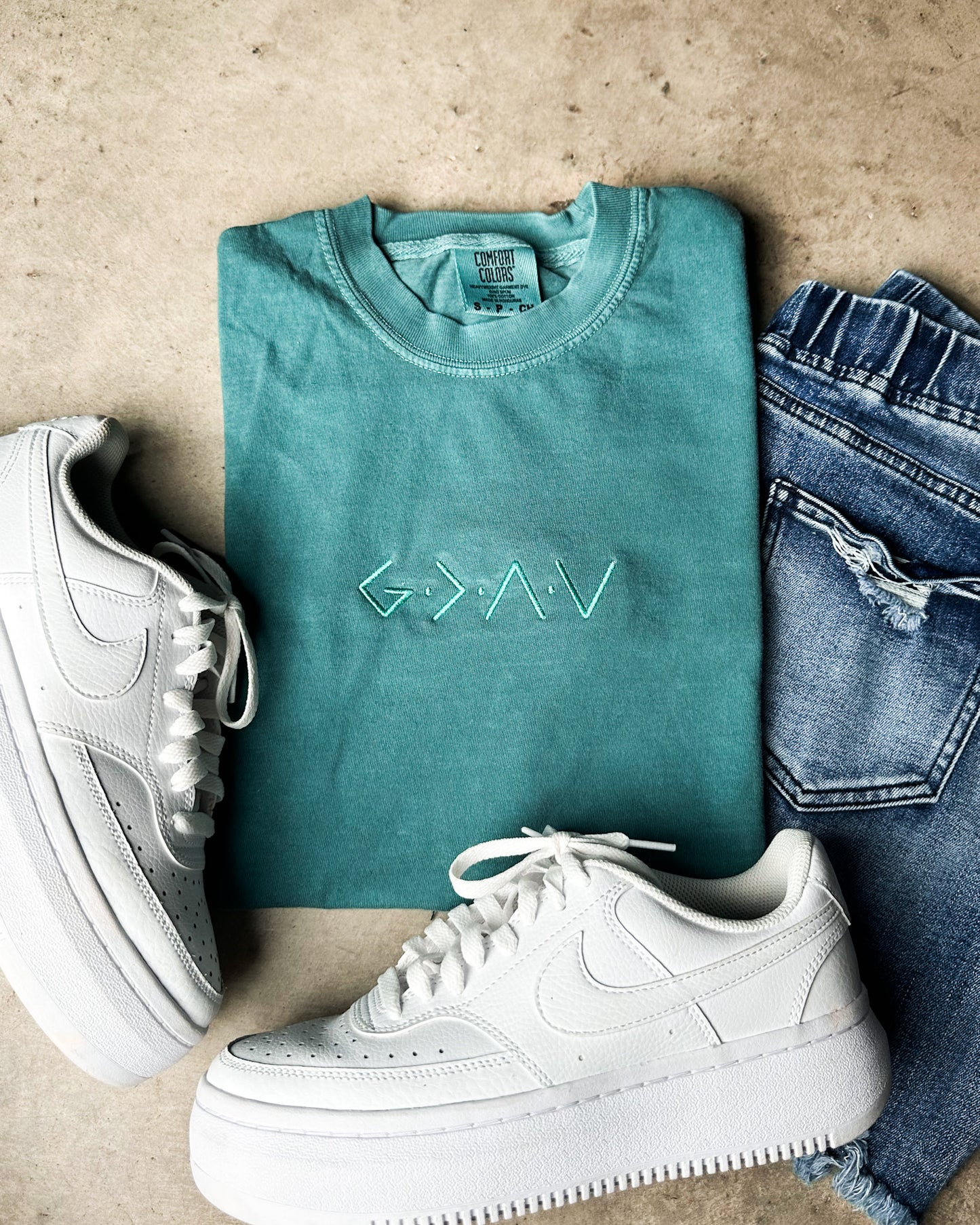 God Is Greater Than Highs & Lows Embroidered Tee